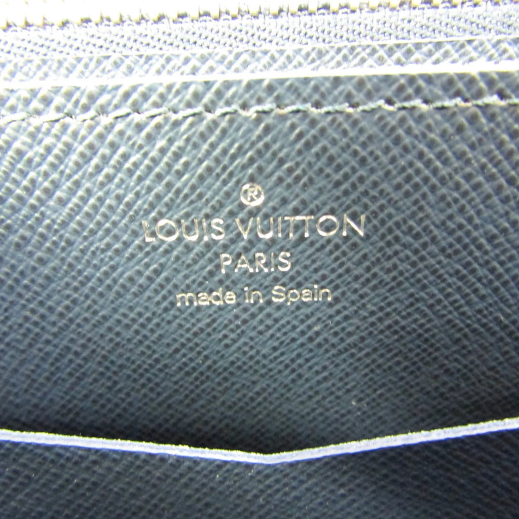 Pre-Owned Louis Vuitton Taiga Zippy XL M64019 Men's Taiga Leather Long Wallet (bi-fold) Navy Blue (Good)