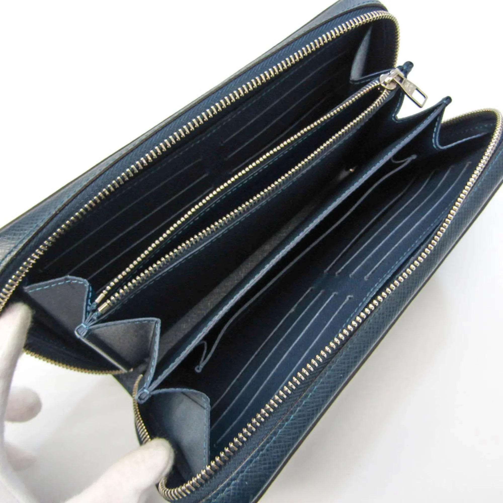 Pre-Owned Louis Vuitton Taiga Zippy XL M64019 Men's Taiga Leather Long Wallet (bi-fold) Navy Blue (Good)